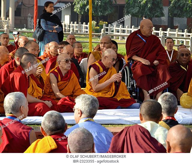 The Dalai Lama and other high dignitaries such as the Karmapa, Sogyal Rinpoche with Buddhist leaders from all over the world in a communal prayer