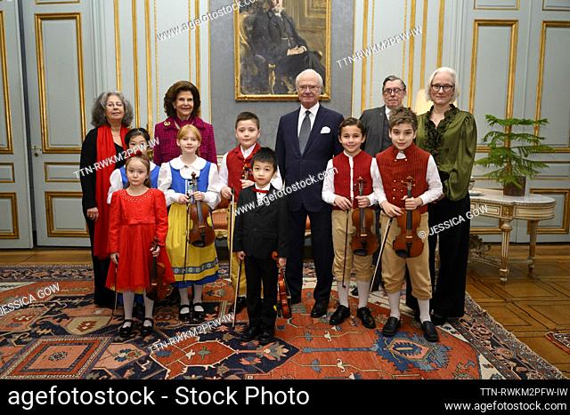 STOCKHOLM 20231220 King Carl Gustaf, Queen Silvia, Nina Balabina, Emilia Gardemar, Hans Dyhlén and students from the Little Academy when the Little Academy...
