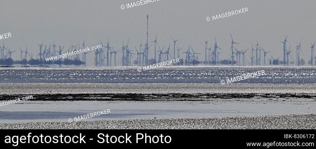 Extremely dense development of the North Sea coast with wind turbines, view of the mainland of Wangerooge, Lower Saxony, Germany, Europe