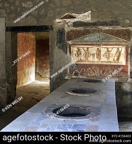 Pompeii Archaeological Site, Campania, Italy. House and Thermopolium of Vetutius Placidus. A Thermopolium was a place which sold ready-made hot meals