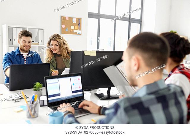 creative team working on user interface at office