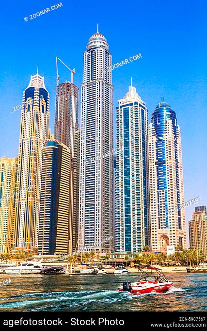 DUBAI, UAE - NOVEMBER 13: Modern buildings in Dubai Marina, Dubai, UAE. In the city of artificial channel length of 3 kilometers along the Persian Gulf