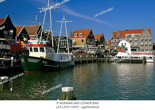 The small port and town of Volendam is on the Ijsselmeer coast. There are historic buildings on the waterfront, and fishing boats still use the harbour