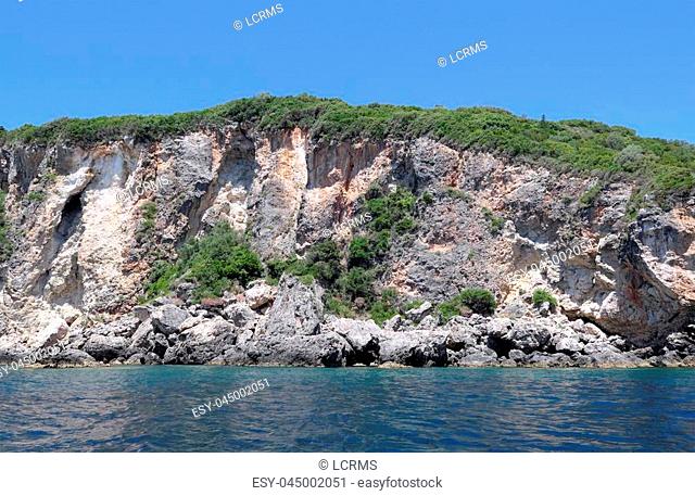 seascape of corfu island at paradise beach of Liapades (Greece). chalk rocks along the cliff
