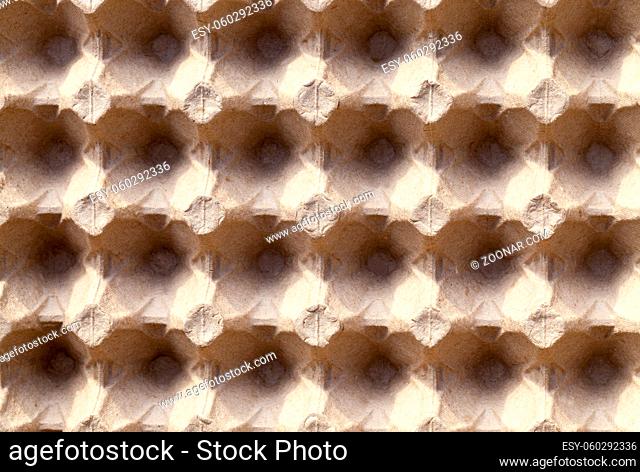 empty cardboard tray for storing eggs, top view close-up