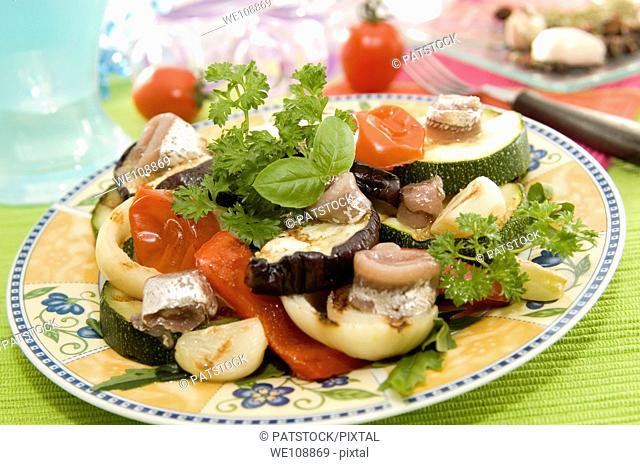 Grilled herring with vegetables salad
