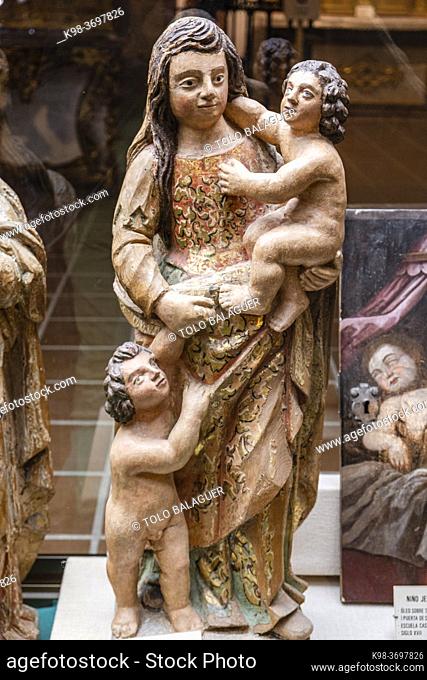 Charity, polychrome wood carving, 16th century, museum of religious art and paleontology, Church of San Bartolomé, Atienza, Guadalajara Province, Spain