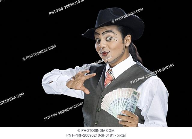 Close-up of a mime performing magic trick