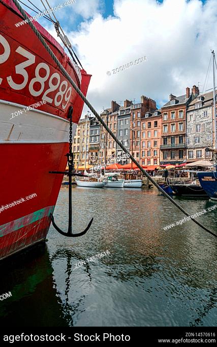 Honfleur, Calvados / France - 15 August 2019: fishing boats in the old part and Vieux Bassin district of Honfleur