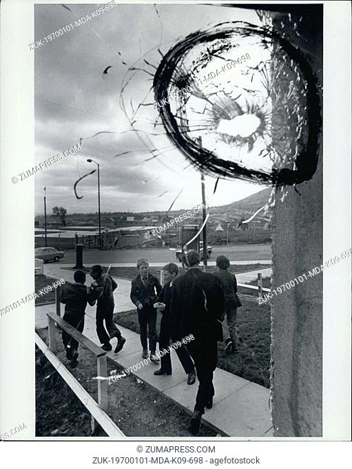 Jan. 01, 1970 - Protestant youth's in Belfast, N. Ireland play under windows shattered by Catholic Ira Sniper fire. (exact date unknown) (Credit Image: ©...