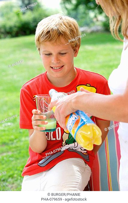 Boy drinking light sodas