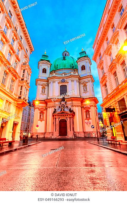 Vienna, Austria: Night view of the St. Peter Church, Peterskirche, a Baroque Roman Catholic parish church at the traditional pedestrian zone Graben