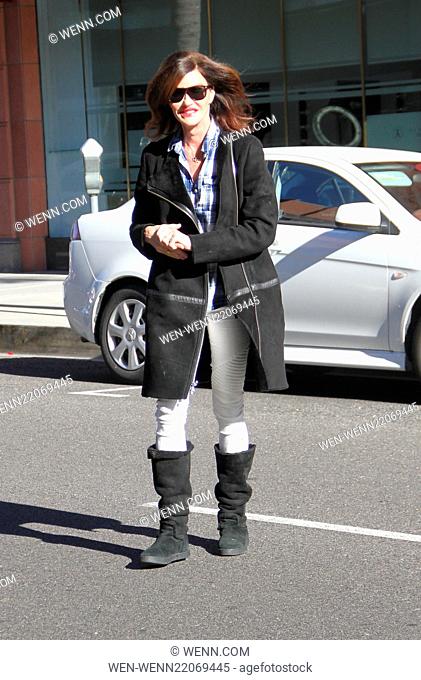 Janice Dickinson goes shopping in Beverly Hills wearing white denim jeans Featuring: Janice Dickinson Where: Los Angeles, California
