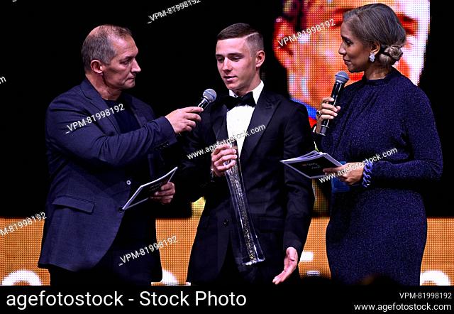 Belgian Remco Evenepoel receives the Sportman of the year trophy from Belgian Cynthia Bolingo Mbongo during the 'Sportgala' award show
