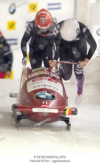 The Austrian bobsleigh team with Katrin Beierl (front) and Sanna Monique Dekker in action during the 1st two-women run of the FIBT World Championship 2017 in...