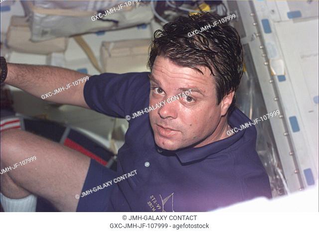 Astronaut Kevin R. Kregel, mission commander, on the mid deck of the Space Shuttle Endeavour. A series of electronic stills was taken of the STS-99 indiviaul...