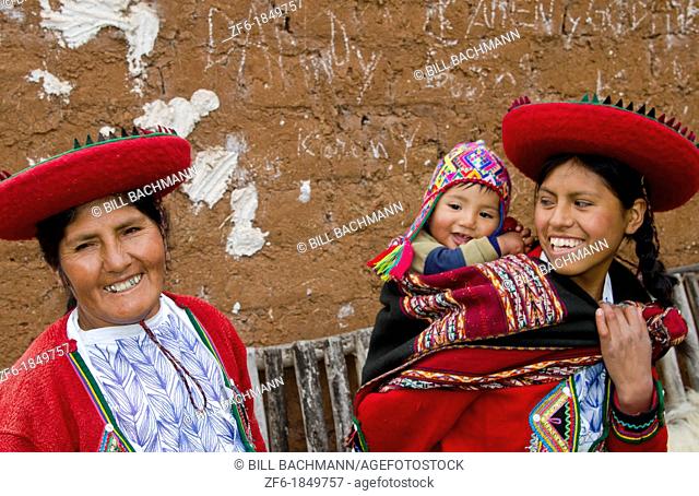 Family with baby in traditional dress in Cusco Cuzco Peru South America