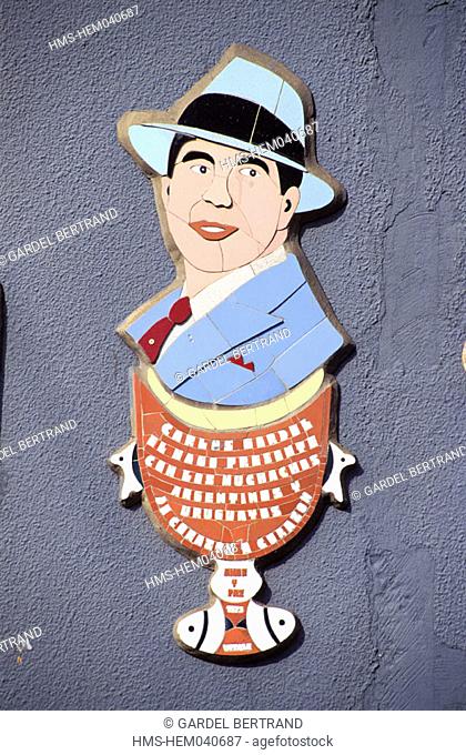 Argentina, Buenos Aires province, Buenos Aires, portrait of Carlos Gardel (the most famous tango singer) in Boca district, Caminito street