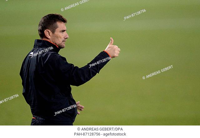 Eupen coach Jordi Condom Aulí gives instructions from the touchline during the friendly soccer match between FC Bayern Munich and KAS Eupen in Doha, Qatar