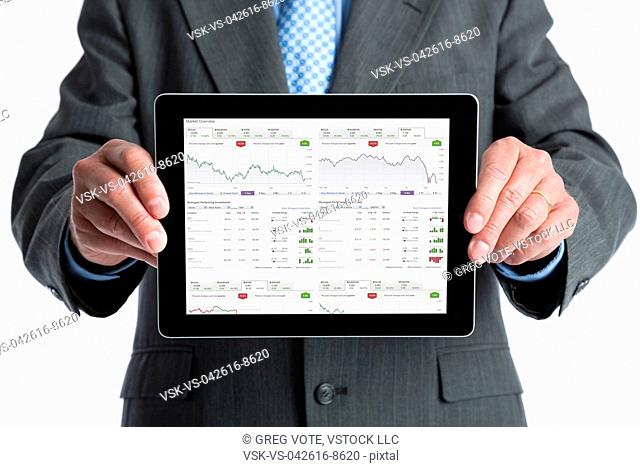 Man showing diagram with stock market data