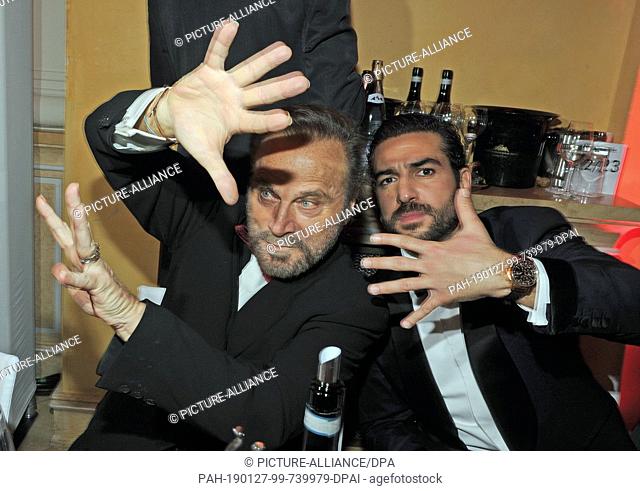 26 January 2019, Bavaria, München: The actors Franco Nero (l) and Elyas M'Barek celebrate at the 46th German Film Ball at the Bayerischer Hof
