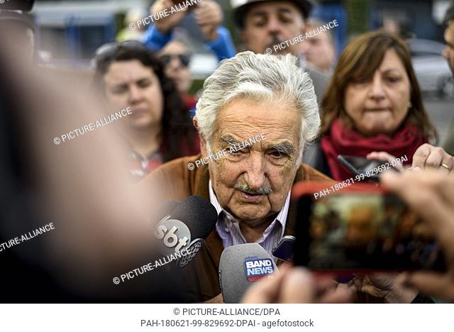 21 June 2018, Brazil, Curitiba: Jose Mujica (C), ex-president of Uruguay, speaking with journalists after his visit in prison of former Brazilian head of state...