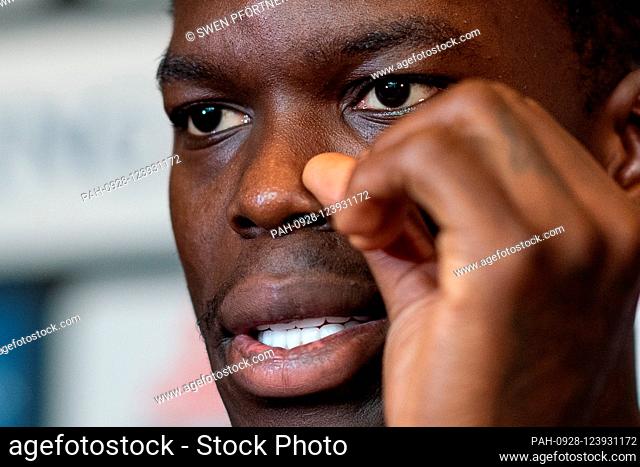 04 September 2019, China, Shenzhen: Basketball: World Cup, press conference of the national team Germany: National player Dennis Schröder talks to journalists...