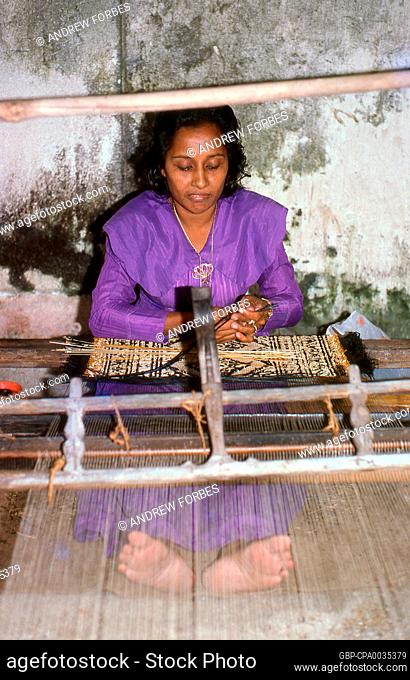 <i>Kunaa</i> weaving is an exclusively female occupation. The women of Gadu cross regularly to the neighbouring island of Gan where they harvest an especially...