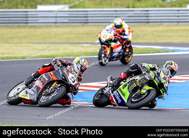 L-R Danilo Petrucci from Italy and Jonathan Rea from Britain compete in Race 2 during the 2023 Superbike World Championship, on July 30, 2023, in Most