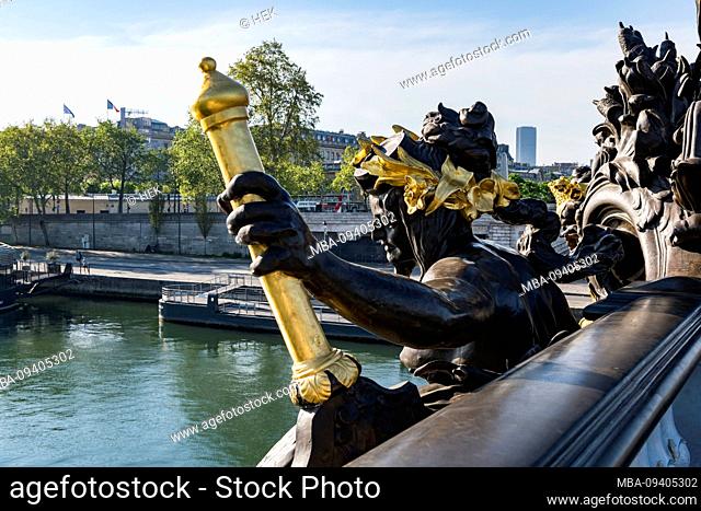 Side view of the statue Nymphes de la Neva avec les armes de la Russie by Georges Récipon on the Pont Alexandre III bridge, Paris, France, Europe