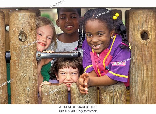 Elementary school children on the playground at Friends School in Detroit, Michigan, USA