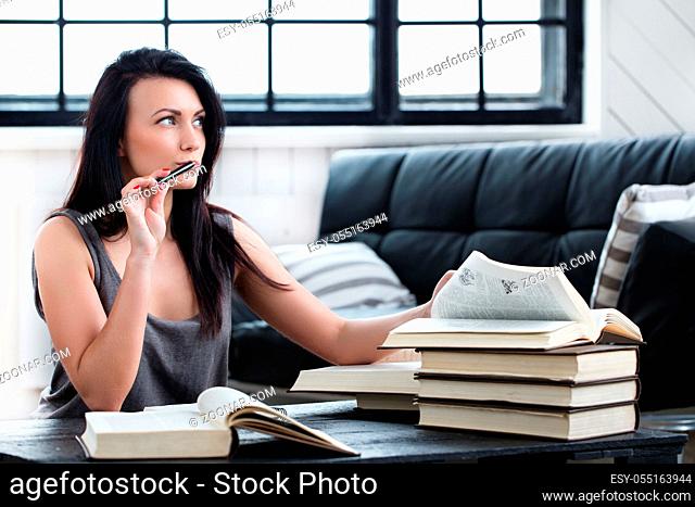 Lifestyle, study. Beautiful girl with a book