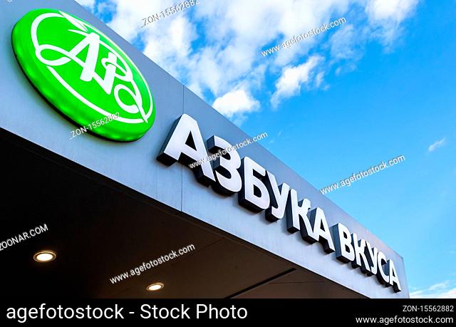 Moscow, Russia - July 9, 2019: Signboard with emblem of Azbuka Vkusa (Alphabet of Taste) supermarket. Azbuka Vkusa is a supermarket chain operated 90 stores in...