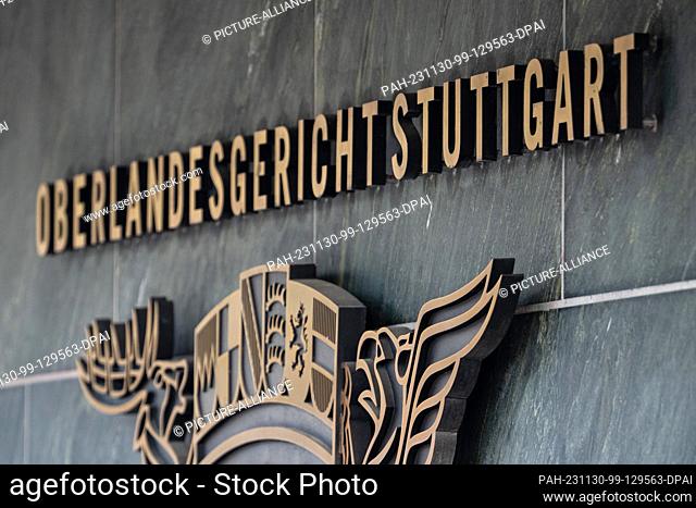 FILED - 10 October 2023, Baden-Württemberg, Stuttgart: A sign points to the Stuttgart Higher Regional Court. The ringleader of a right-wing terrorist group was...