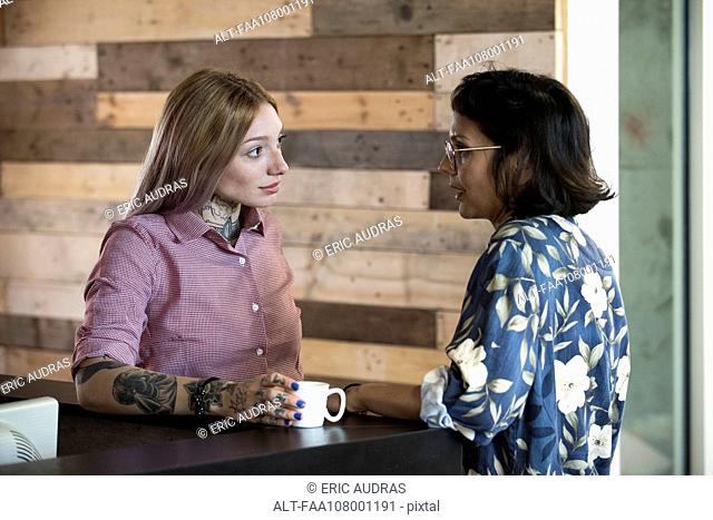 Women chatting during coffee break