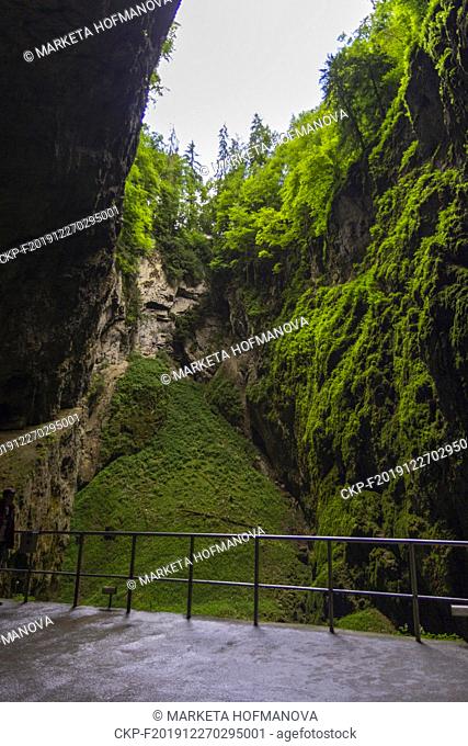 The Macocha Abyss, also known as the Macocha Gorge, is a sinkhole in the Moravian Karst cave system of the Czech Republic located north of the city of Brno