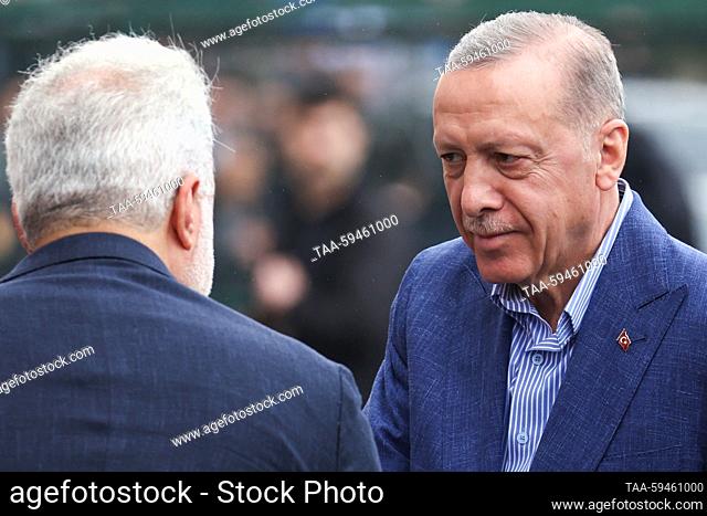 RUSSIA, ISTANBUL - MAY 28, 2023: Incumbent Turkish president and presidential candidate Recep Tayyip Erdogan (C) is seen at a polling station in Saffet Cebi...