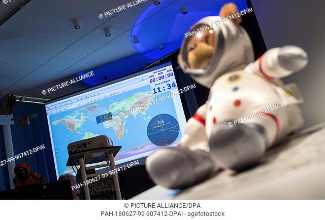 27 July 2018, Herrenberg, Germany: Pupils of the Schickhardt secondary school during a skype session with ESA astronaut Gerst who is currently stationed atop...