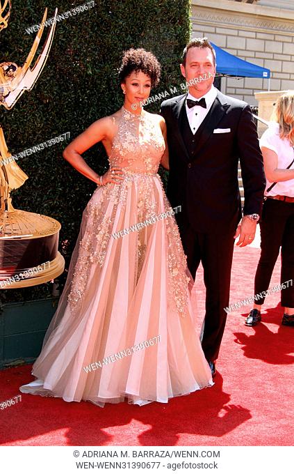 2017 Daytime EMMY Awards Arrivals held at the Pasadena Civic Center. Featuring: Tamera Mowry-Housley, Adam Housley Where: Los Angeles, California