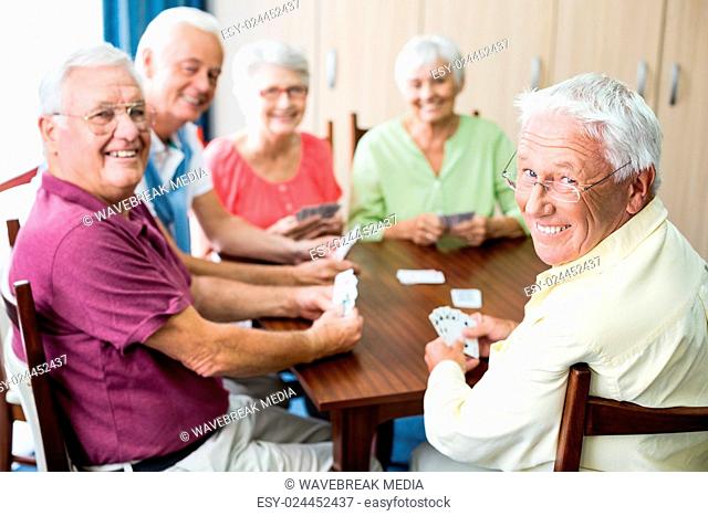 Seniors playing cards together