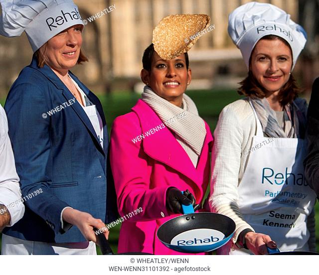 Parliamentary Pancake Race in aid of charity Rehab, Victoria Park Featuring: Tracey Crouch MP, minister for sport, (left), Naga Munchetty