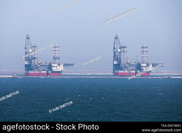 CHINA, HEBEI PROVINCE - MAY 24, 2023: A view shows the TS Opal and TS Emerald offshore drilling rigs at Shanhaiguan Shipyard as seen from Laolongtou (Old...