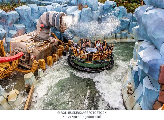 Park guests riding Popeye & Bluto’s Bilge-Rat Barges in Toon Lagoon at Universal Studios Islands of Adventure in Orlando