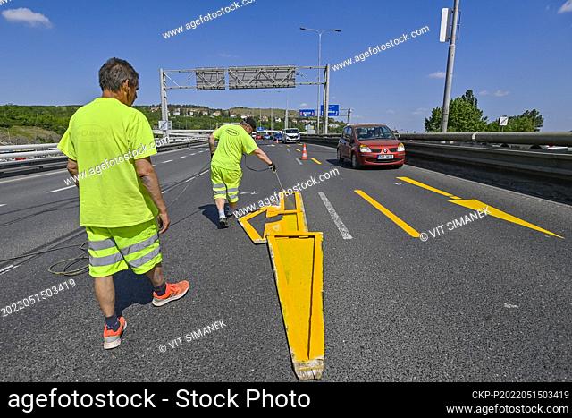 Road workers continued marking detours and traffic restrictions ahead of Monday's start of the first stage of the reconstruction of the Barrandov Bridge, Prague