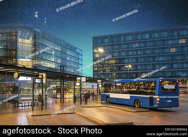 Helsinki, Finland. Bus Is At Stop On Helsinki Railway Square. Bright Blue Starry Sky Above Square Serves As Helsinki Secondary Bus Station And Main Kamppi...