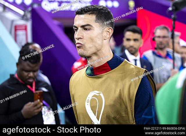 10 December 2022, Qatar, Doha: Soccer: World Cup, Morocco - Portugal, final round, quarterfinal, Al-Thumama Stadium, Portugal's Cristiano Ronaldo (M) walks to...