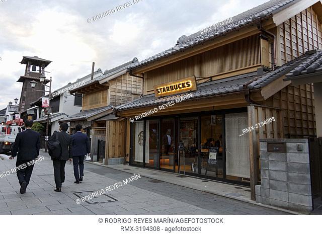 December 5, 2018, Saitama, Japan - Pedestrians walk past a Starbucks coffee shop at Kanetsuki Street in Kawagoe. The branch opened last March is located near to...