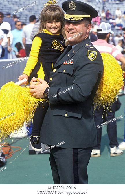 Military Officer with Little Girl at Football Game, West Point Military Academy, New York