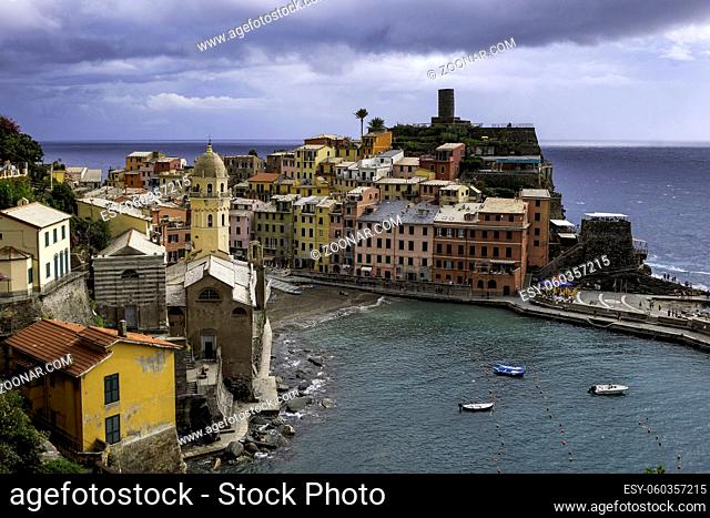 Classic Postcard Aerial View of Vernazza, Cinque Terre, Italy - Colorful Houses and a Beautiful Natural Harbor with Bright Blue Water