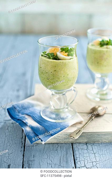 Asparagus mousse in glasses with quail's egg and cress